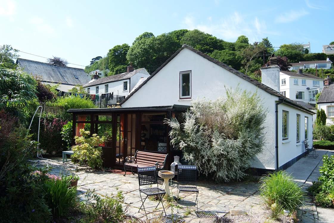 The courtyard garden at the rear of the cottage is a south-facing sun-trap.