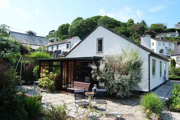 The courtyard garden at the rear of the cottage is a south-facing sun-trap.