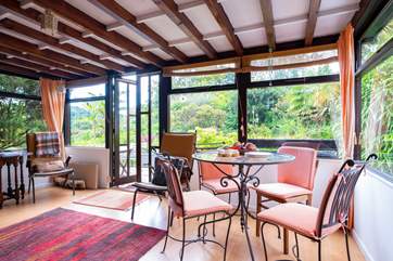 The sun-room leads out to the sunny patio.