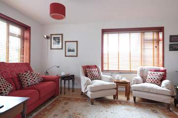 The sitting-room is very comfortably furnished.
