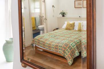 The shower room leads off the bedroom.