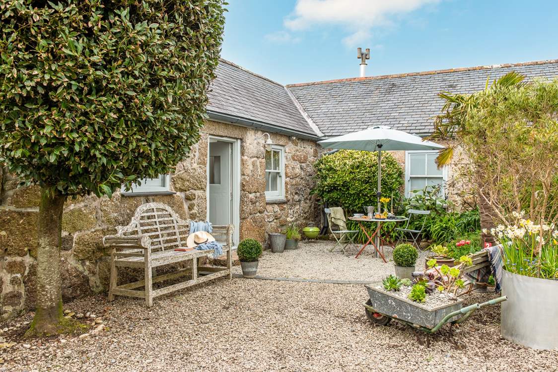 This blissful courtyard is perfect for al fresco dining.