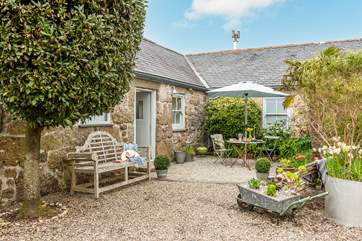 This blissful courtyard is perfect for al fresco dining.