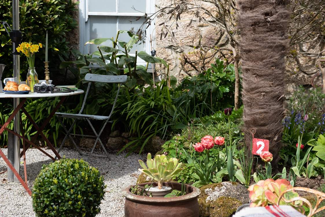 Oh so pretty, the courtyard has gorgeous potted plants.