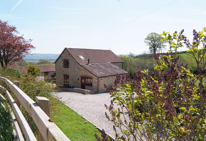 Stable Tallet is a beautiful barn conversion to one side of the historic farmstead here, in its own gardens and with its own driveway.