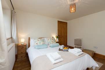 Another view of the ground floor bedroom - it has a little fitted shower cubicle in one corner.