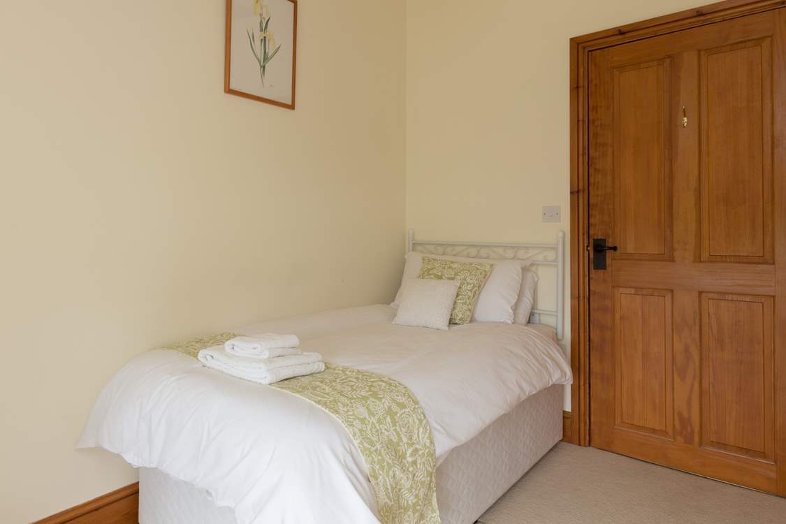 This pretty single bedroom is also on the first floor.