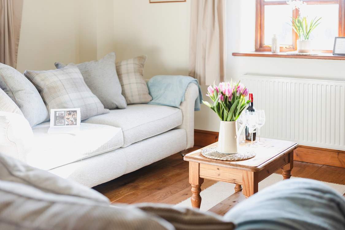 Relax in front of the Smart TV in the sitting-room.