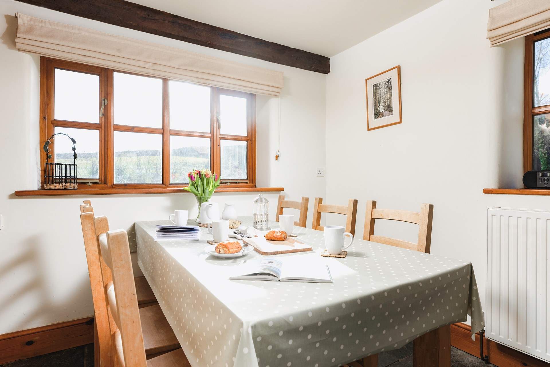 This is the dining-area of the kitchen, with its lovely farmhouse kitchen table.