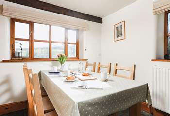This is the dining-area of the kitchen, with its lovely farmhouse kitchen table.