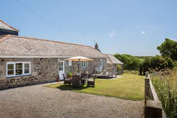 Rowes Cottage has its own private garden to the front. (Please note, garden furniture is available Easter to October and may be different to this photograph).
