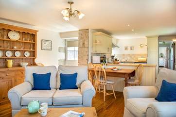 Curl up on the sofa in front of the wood-burner.