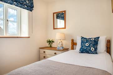 The single bedroom is very cute.