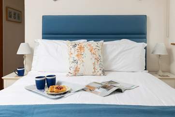 The master bedroom (bedroom 1) is stylish and comfortable.