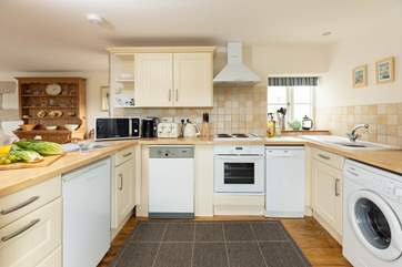 The open plan kitchen has everything you need!