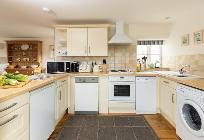 The open plan kitchen has everything you need!
