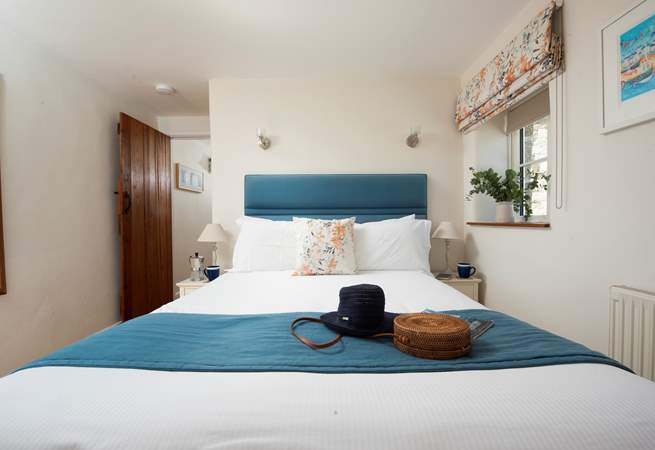 The main bedroom (bedroom 1) is stylish and comfortable.