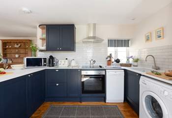 The open plan kitchen has everything you need!