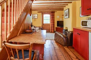 The open plan living areas make this cottage a really great place for a family gathering. The wood-burner is for ornamental purposes only.
