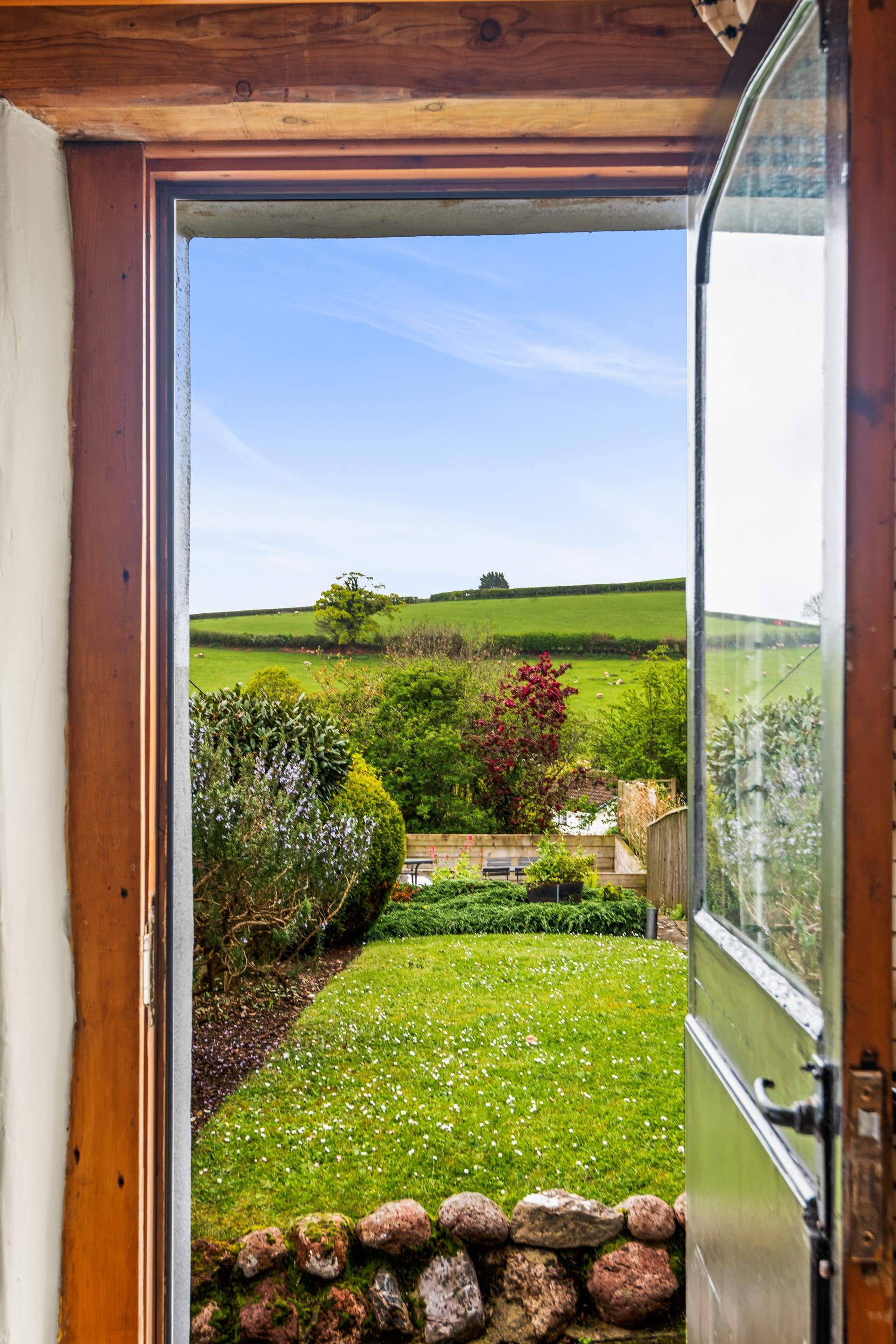Looking out to your garden and the fields beyond.