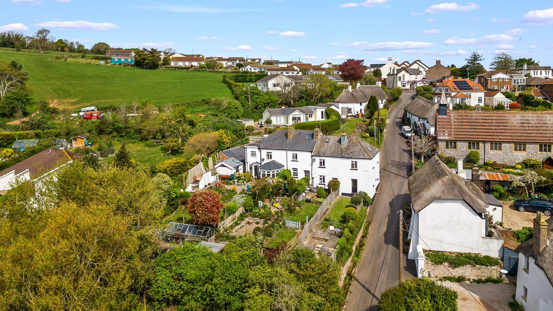 The pretty village of Holcombe. The cottage is on the left halfway up the hill.