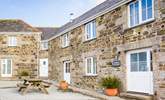 The front of Pebble Cottage overlooks the courtyard. - Thumbnail Image