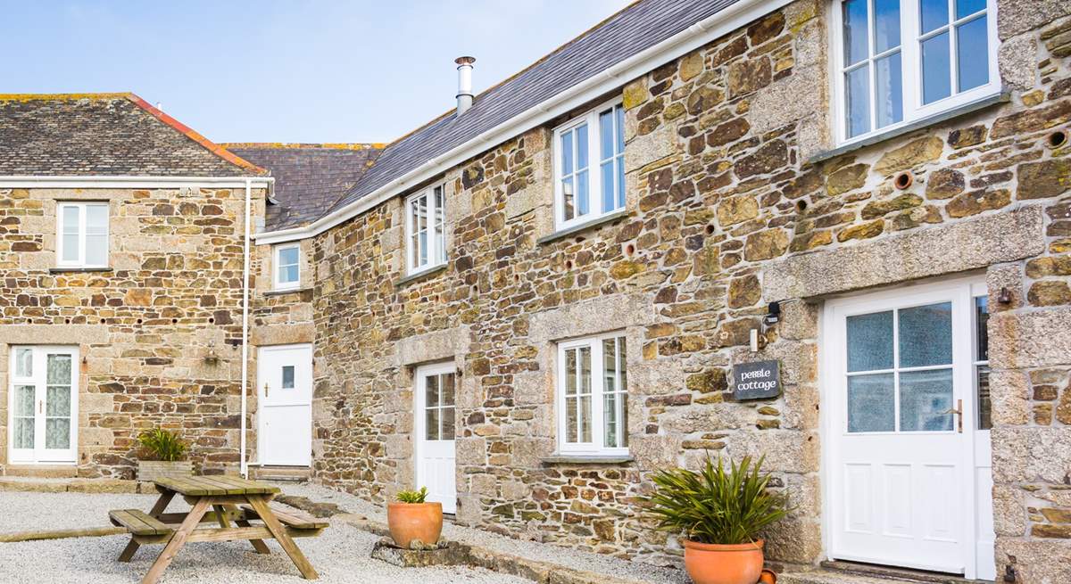 The front of Pebble Cottage overlooks the courtyard.