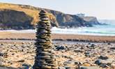 Whether you like to build sandcastles or pebble towers, this beach has both! - Thumbnail Image