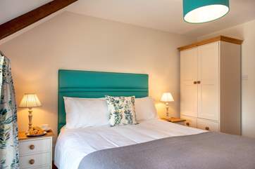 The master bedroom has an en suite shower-room.