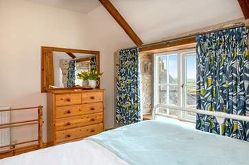 Bedroom 3 has glimpses out to sea.