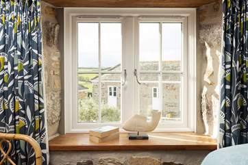 Bedroom 3 has glimpses out to sea.