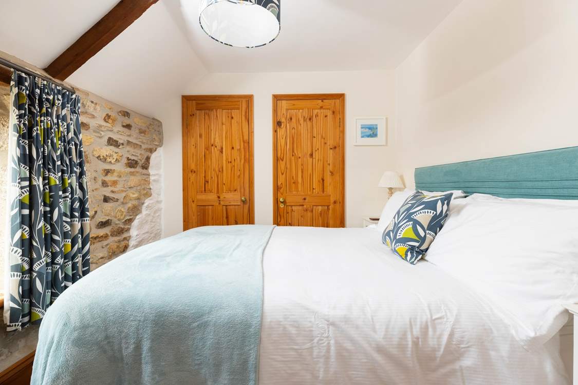 Bedroom 3 has a king-size bed.