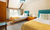 The twin bedroom has lovely coastal colours (Bedroom 2). - Thumbnail Image