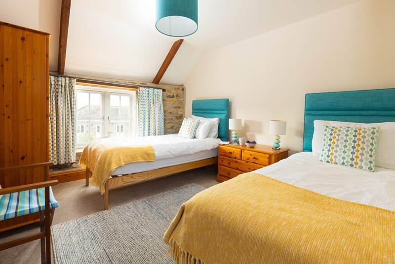 The twin bedroom has lovely coastal colours (Bedroom 2).