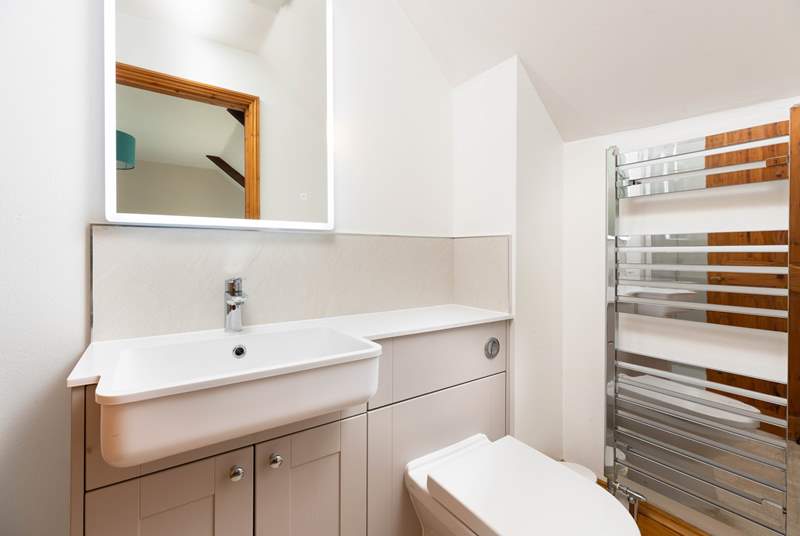 The handy WC on the ground floor with heated towel rail. 