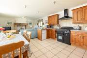 The spacious kitchen/dining-area of the cottage.