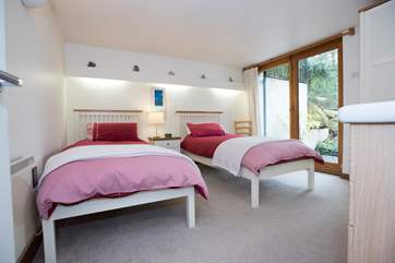 Bedroom 1 has twin beds.