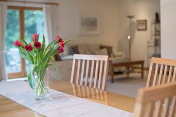 Looking towards the sitting-area from the dining-table.