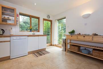 There is a door out to the garden from the kitchen.