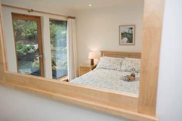 There is a door out to the garden from the bedroom.