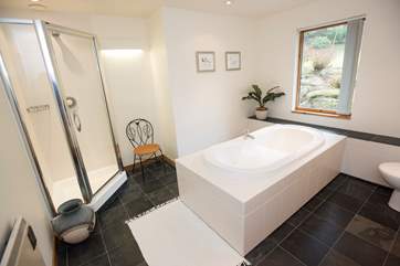 The family bathroom is extremely spacious.