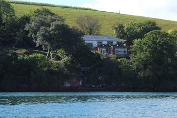 Redcliffe viewed from the water, with the spiral staircase down to the small jetty.