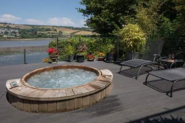 The fabulous sunken hot tub treats you to some of the most fantastic views over the water.