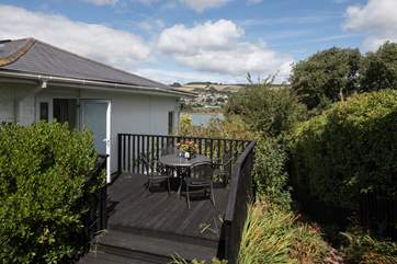 The private decking which leads out from Bedroom 1 is perfect to enjoy a spot of breakfast with a view.