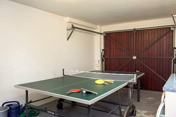 The garage has a table tennis table to entertain all ages groups.