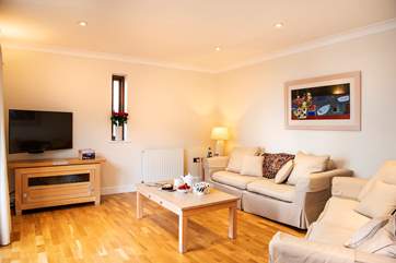 The sitting room is light and airy, time for tea anyone?