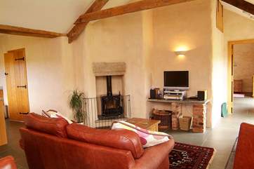 There is a delightful multi-burner in the corner of the living-room, making this an ideal retreat all year round.