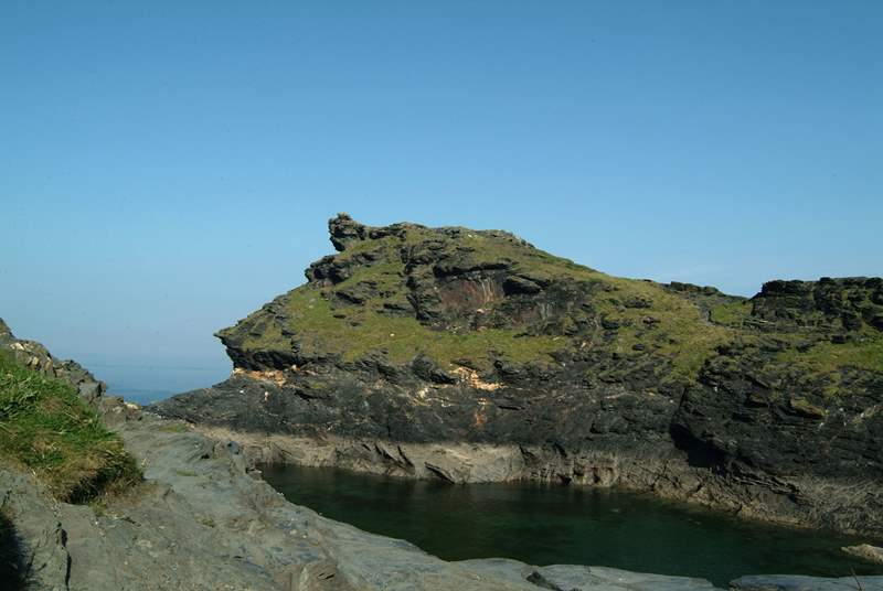Boscastle's dog-leg harbour leads out to the open sea.