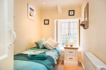 The single bedroom at the front of the house.