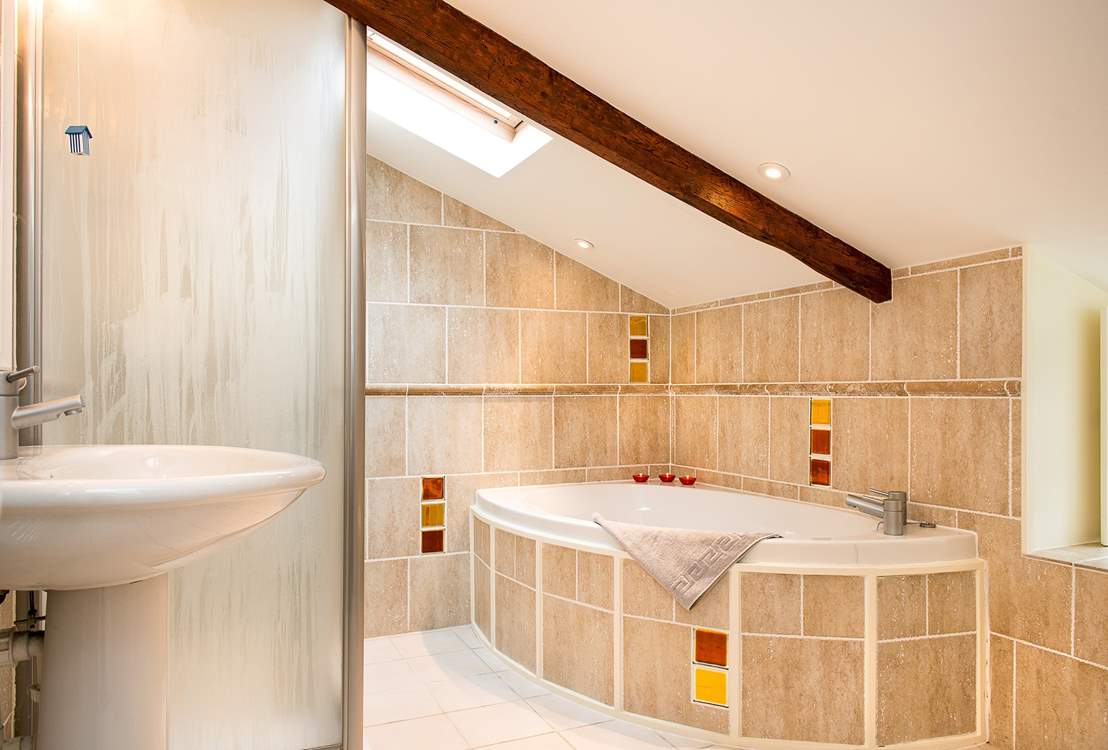 The family bathroom has a bath and a separate shower.